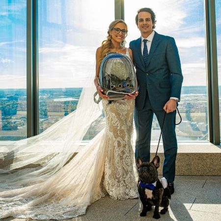 Kat Timpf and Cameron pet dog Carl was with them through the wedding.